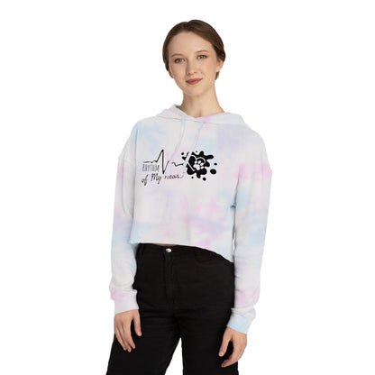 Person wearing a tie-dye hoodie with a graphic design on a white background