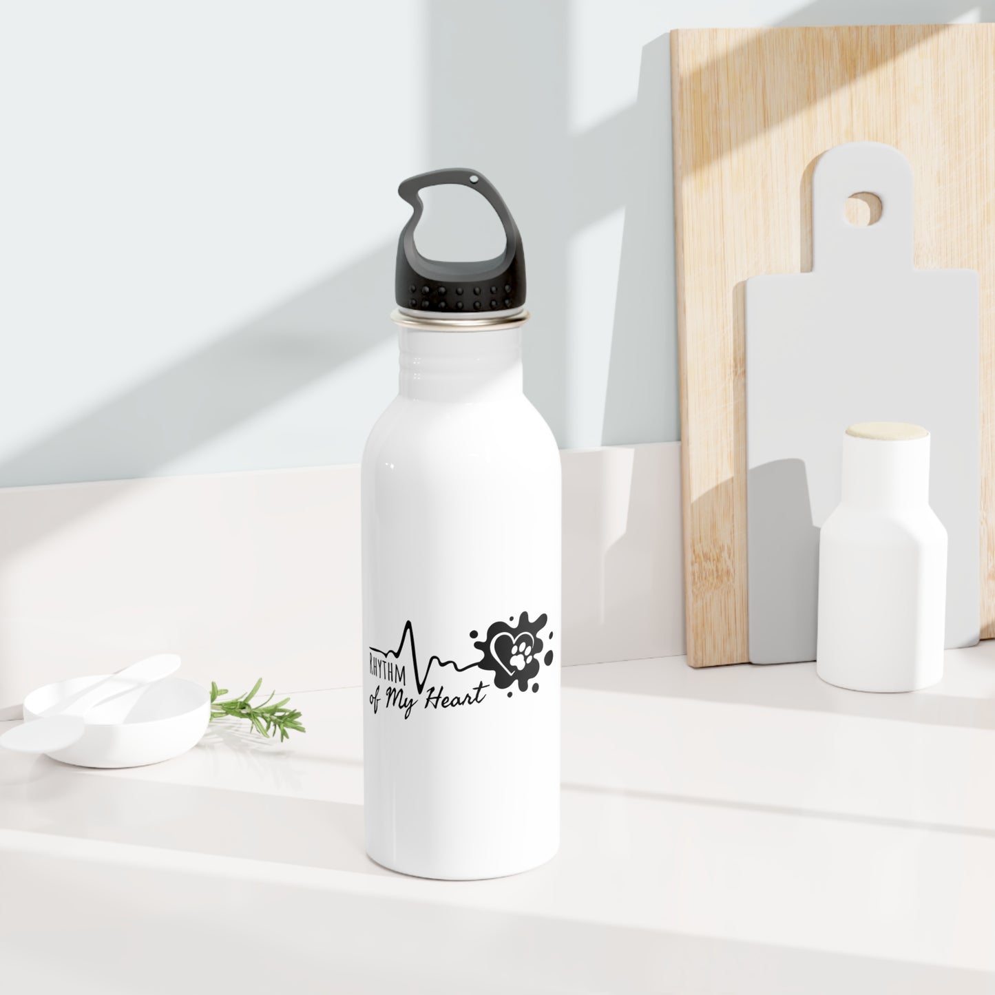White water bottle with black logo on a white surface