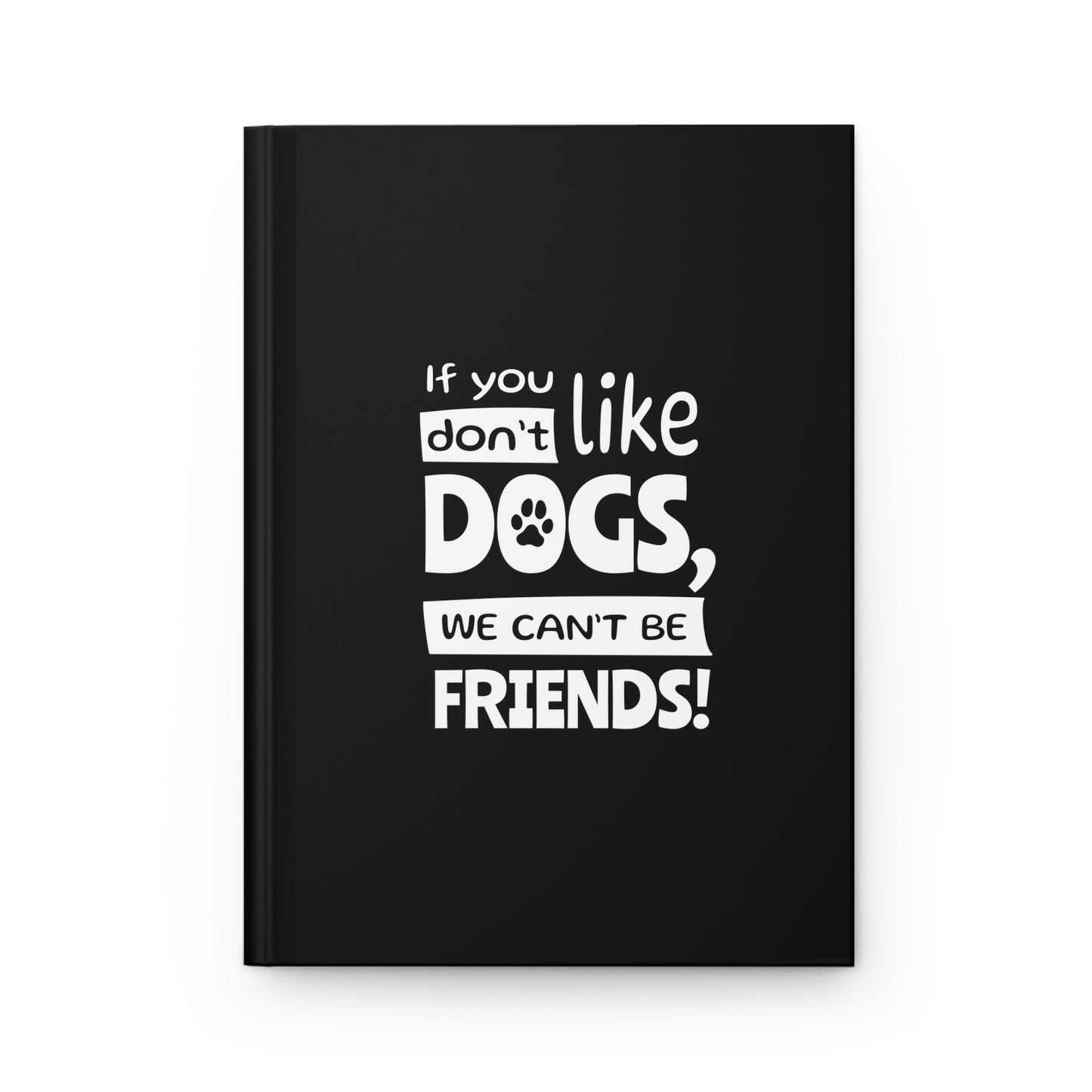 Black notebook with white text 'If you don't like dogs, we can't be friends!' on a white background
