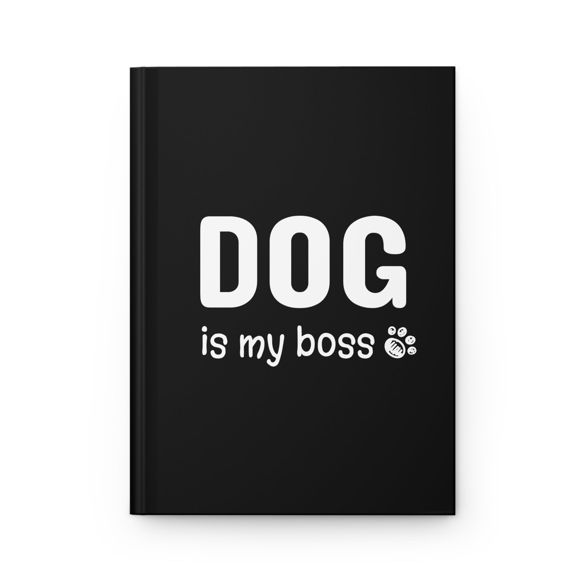 Black notebook with 'DOG is my boss' text on a white background