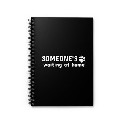 Black notebook with 'SOMEONE'S waiting at home' text on a white background