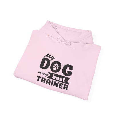 Pink hoodie with text 'My dog is my best trainer' on a white background