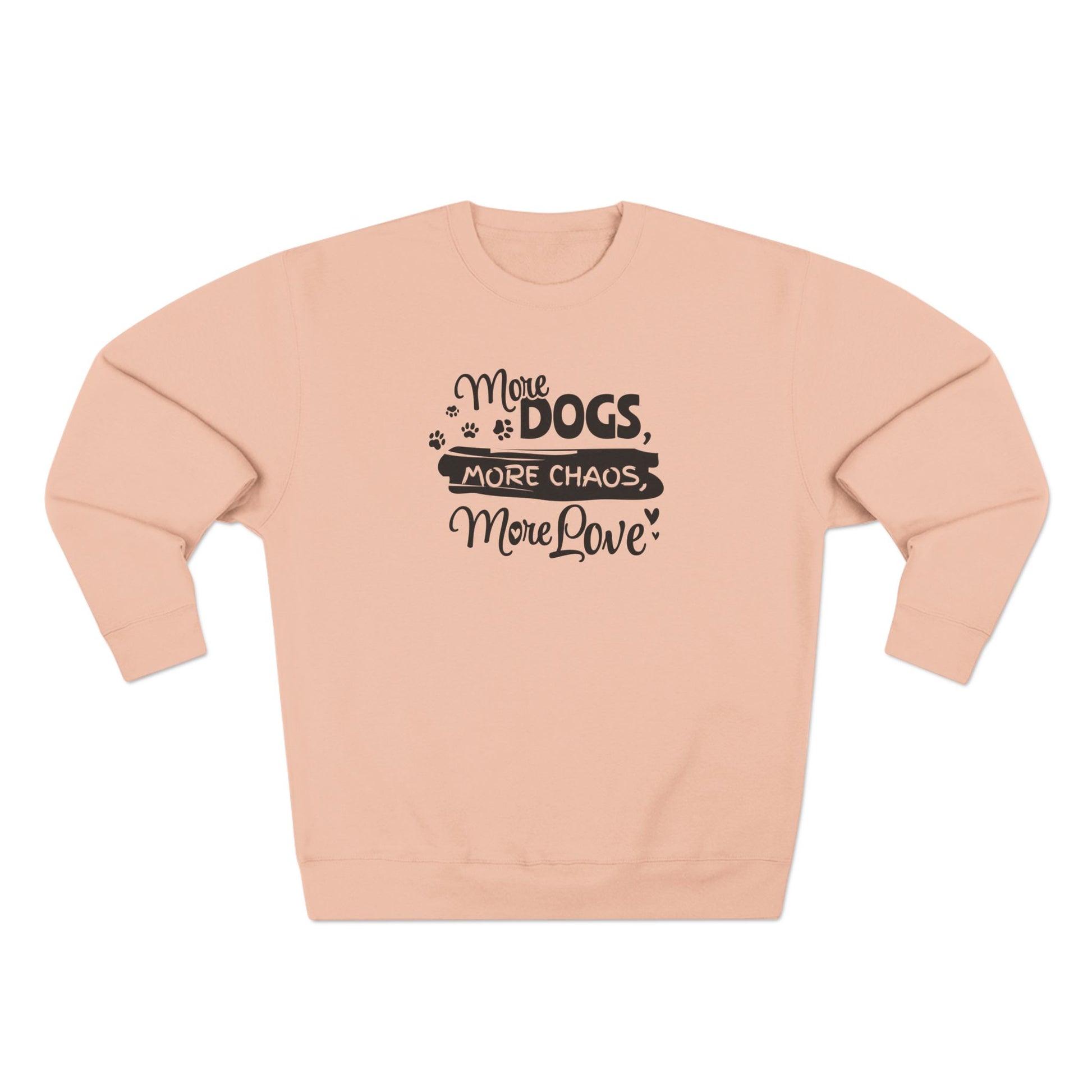 Pink sweatshirt with text 'More dogs, more chaos, more love' on a white background