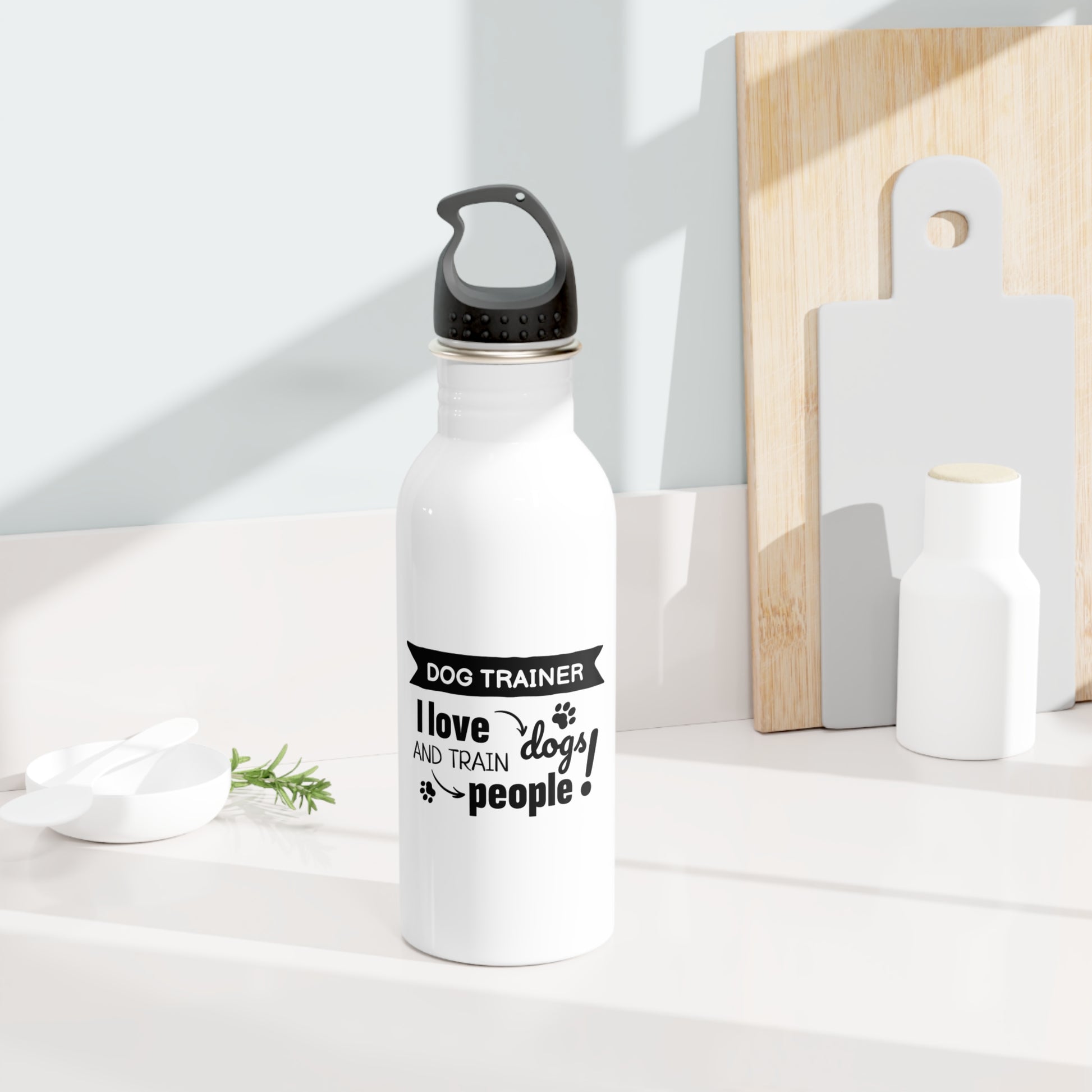 White water bottle with black text on a white surface with wooden cutting board