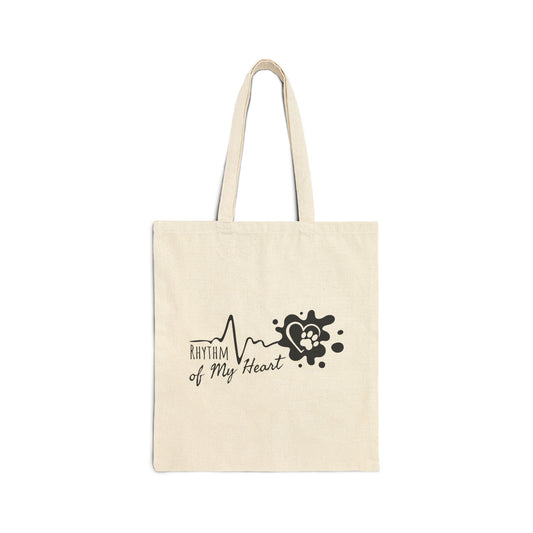 Beige tote bag with 'Rhythm of My Heart' design on a white background