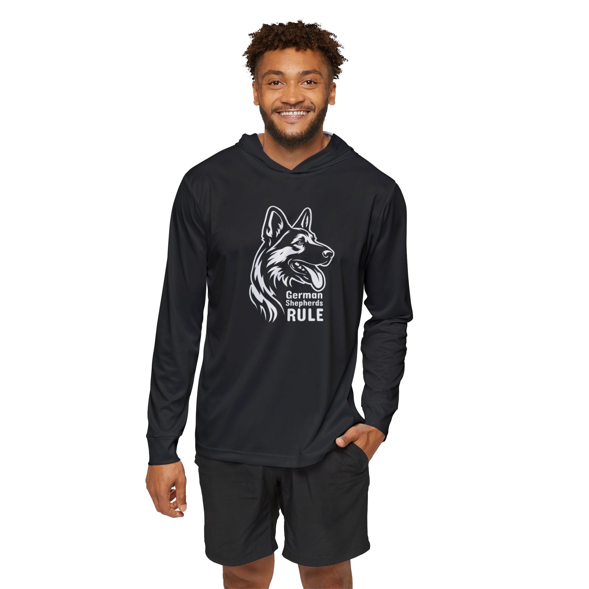 Man wearing a black hoodie with a dog graphic and text on a white background