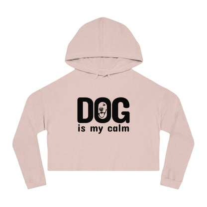 Pink cropped hoodie with 'DOG is my calm' text on a white background