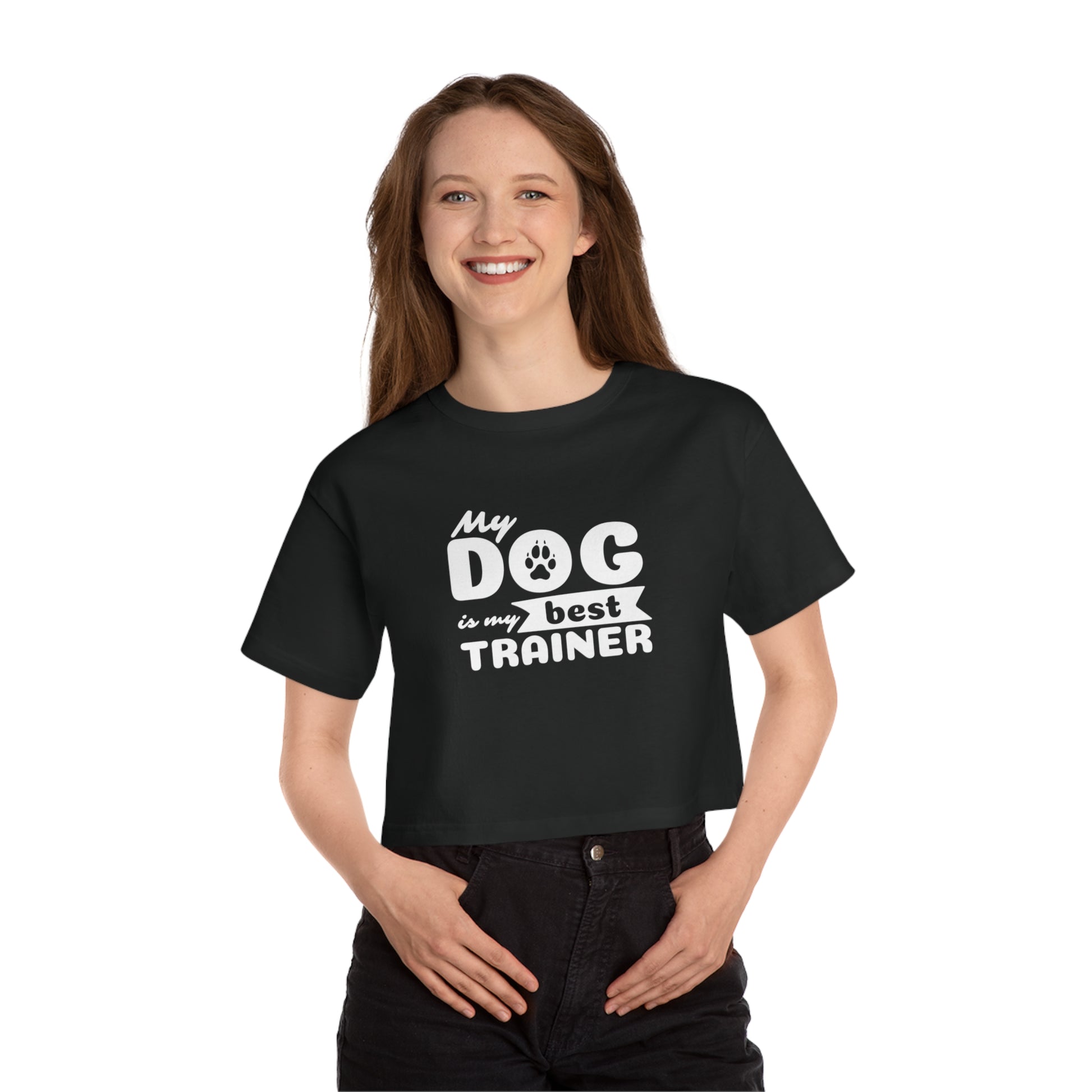 Person wearing a black t-shirt with 'My dog is my best trainer' text on a white background
