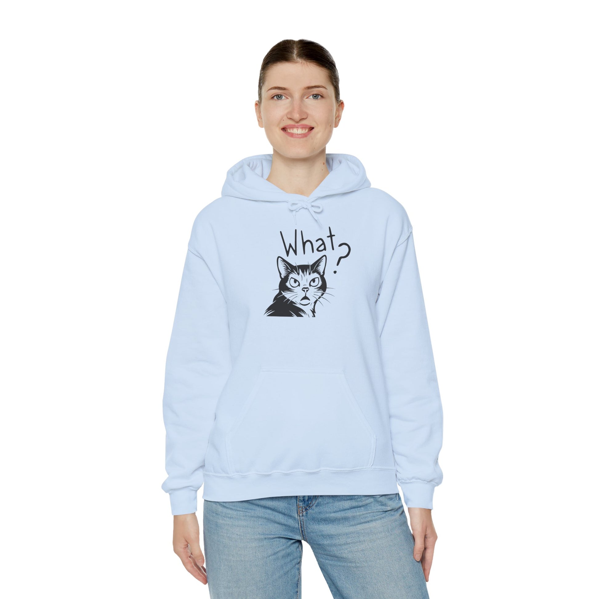 Person wearing a light blue hoodie with a cat graphic and 'What?' text on a white background