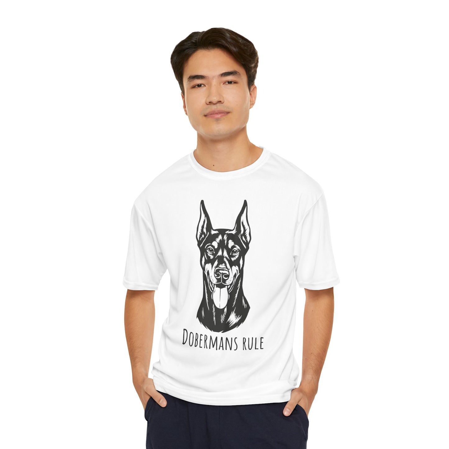 Man wearing a white t-shirt with a doberman graphic and 'Dobermans Rule' text on a white background