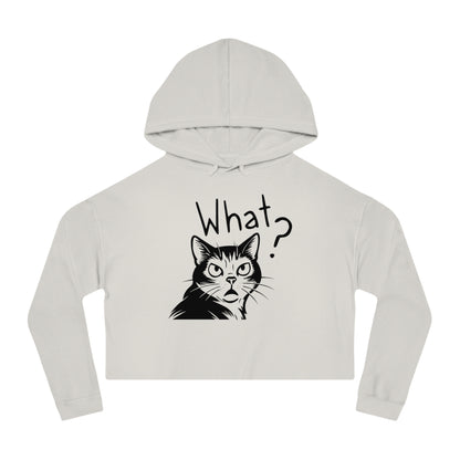 White cropped hoodie with a cat graphic and 'What?' text on a white background