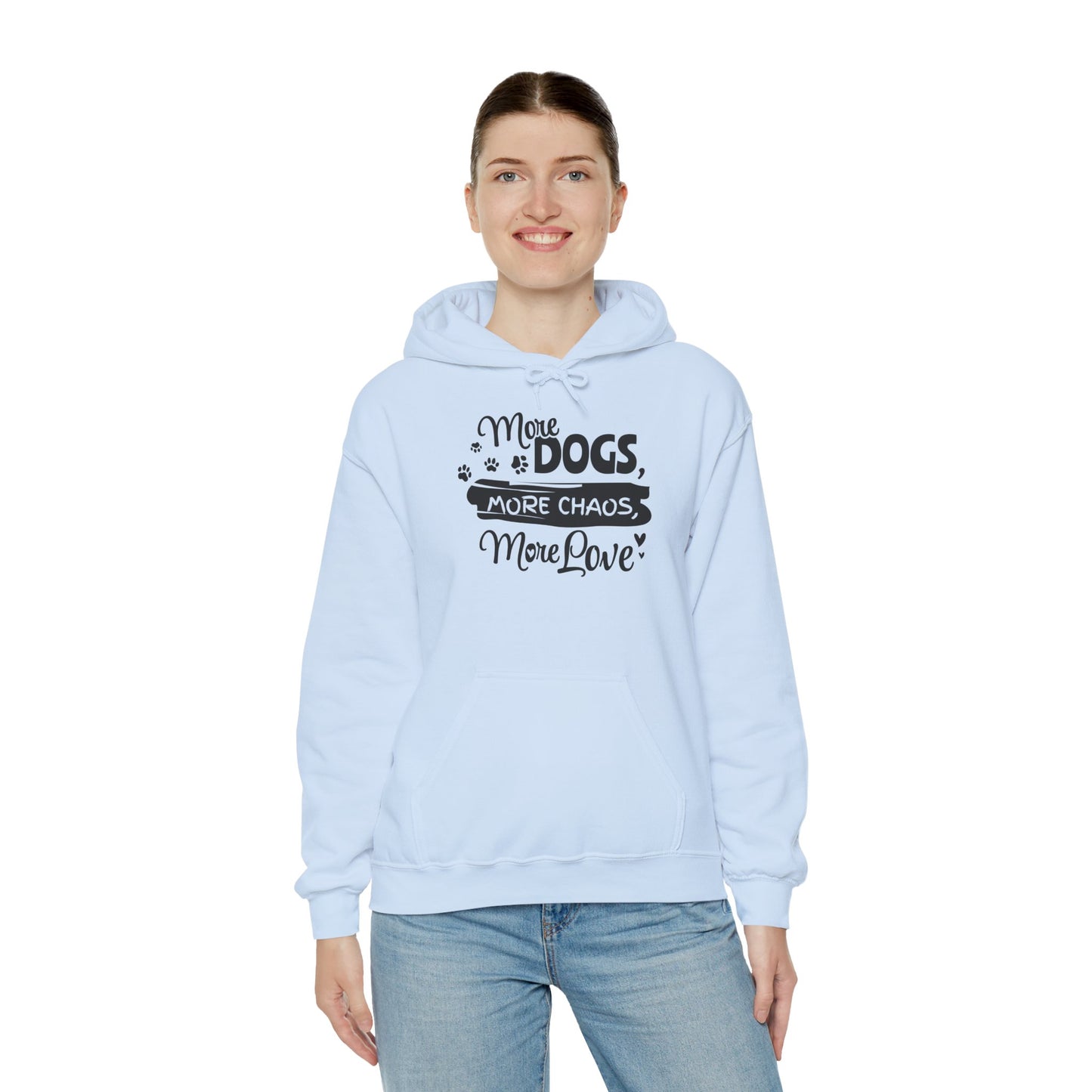 Light blue hoodie with text 'More Dogs, More Chaos, More Love' worn by a person on a white background