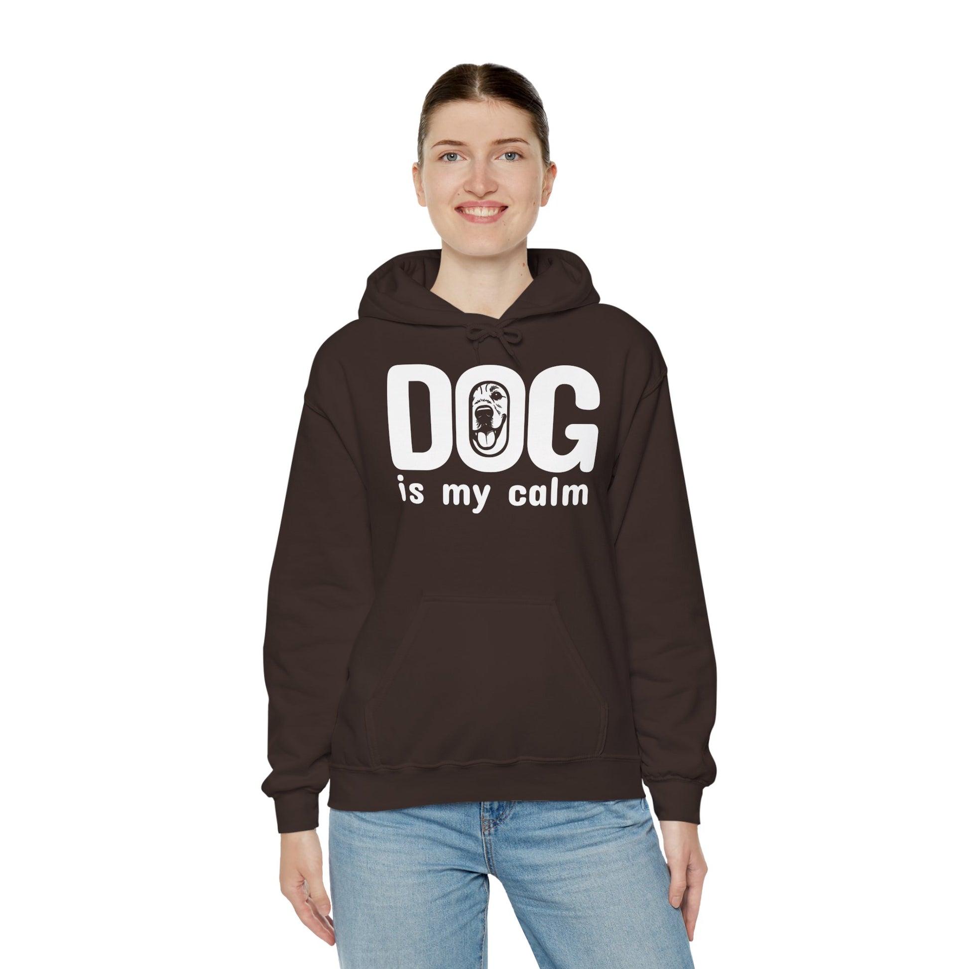Person wearing a brown hoodie with 'DOG is my calm' text on a white background