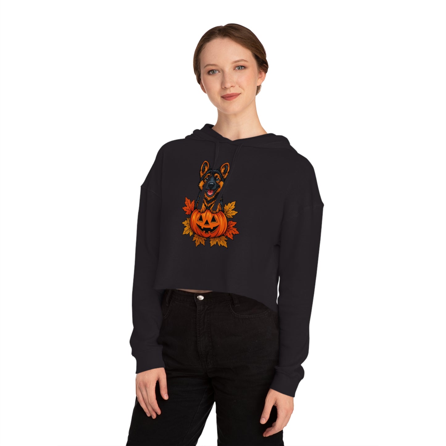 Person wearing a black hoodie with a Halloween-themed design on a white background