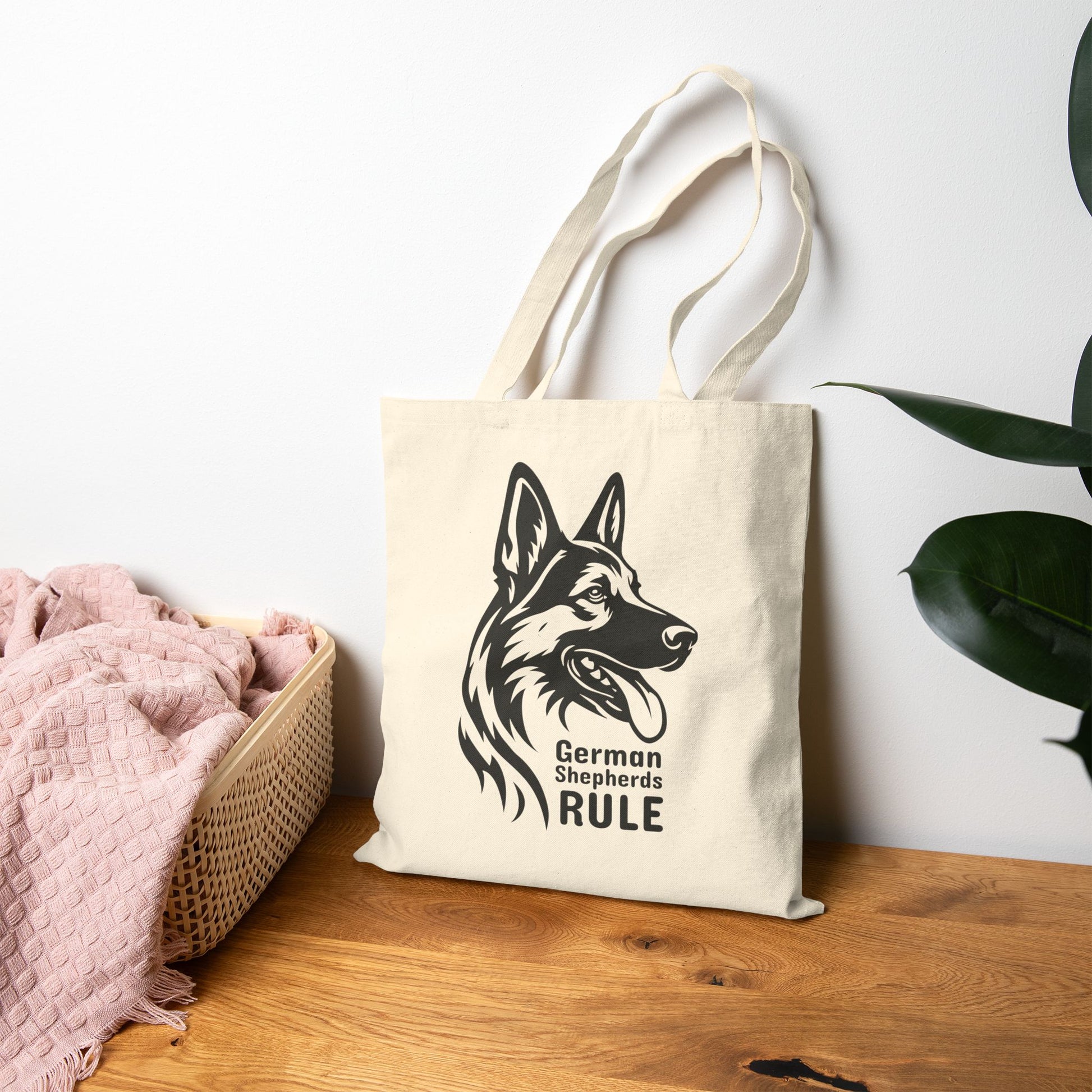Tote bag with German Shepherd design and 'German Shepherds Rule' text on a wooden surface.