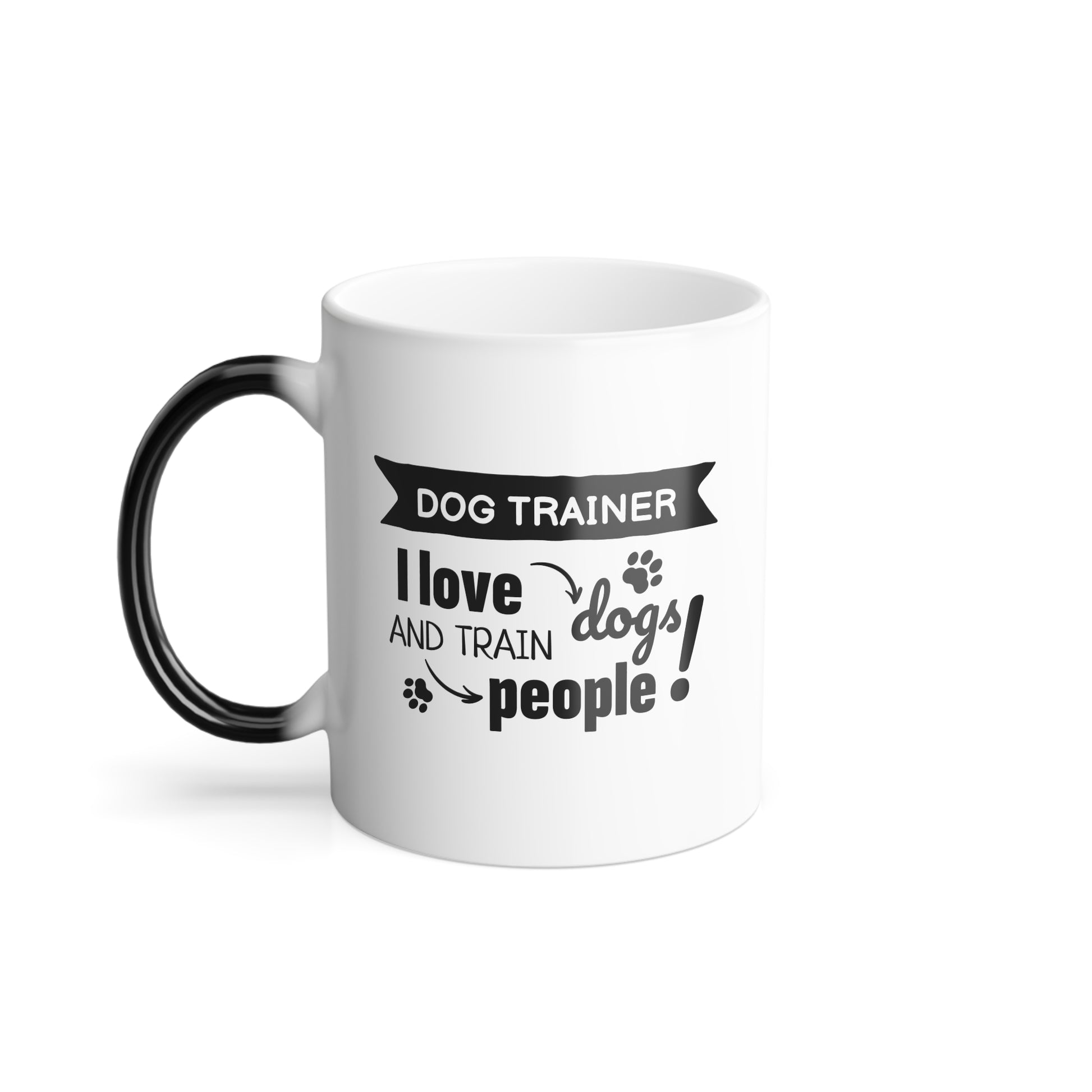 White mug with black text and handle, featuring a dog trainer design.