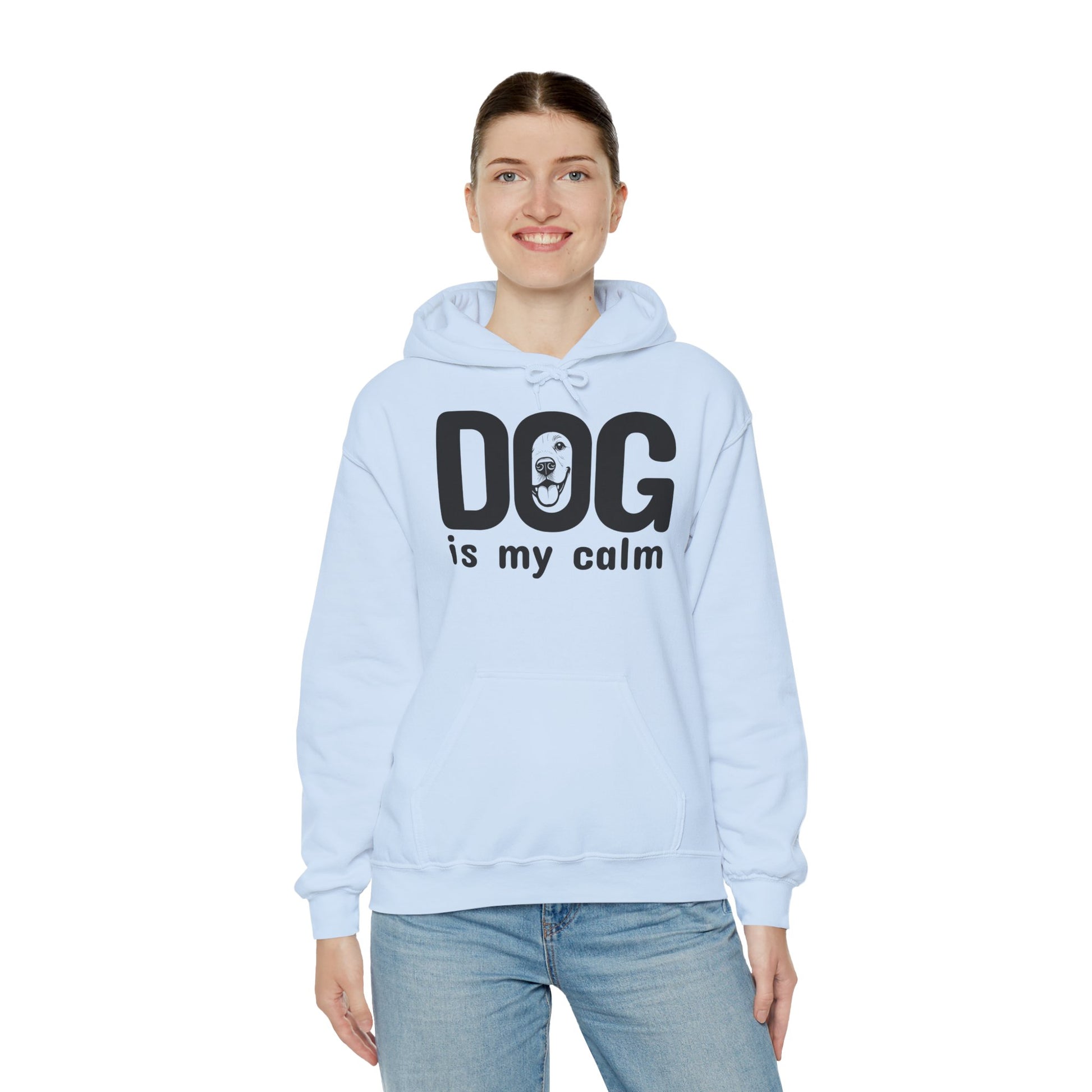 Person wearing a light blue hoodie with 'DOG is my calm' text on a white background