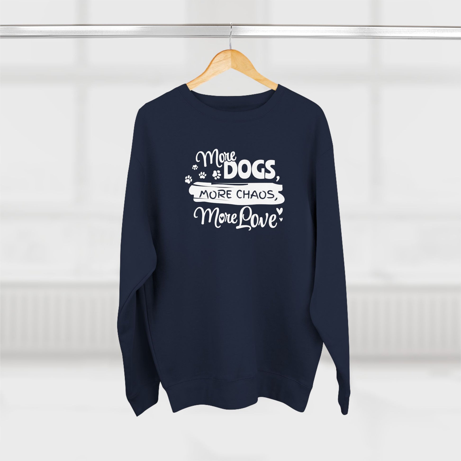 Navy blue sweatshirt with white text on a wooden hanger against a white background