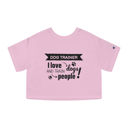 Pink crop top with black text 'Dog Trainer I love dogs and train people' on a white background