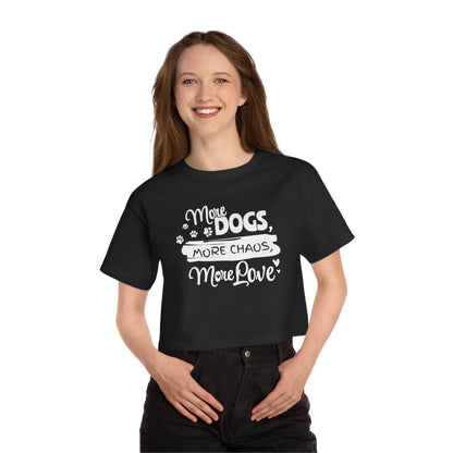 Person wearing a black t-shirt with white text and graphics on a white background