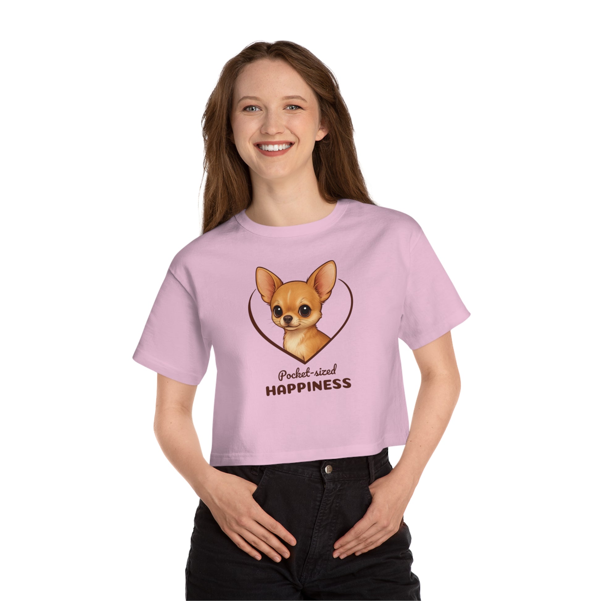 Person wearing a pink t-shirt with a dog graphic and text on a white background