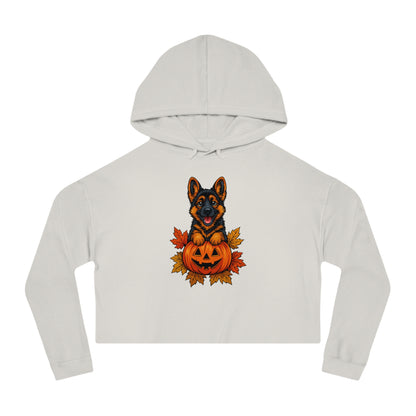 White cropped hoodie with a German Shepherd and pumpkin design on a white background