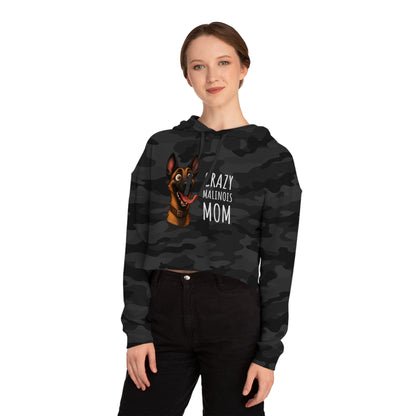 Person wearing a black camouflage hoodie with a dog graphic and text on a white background