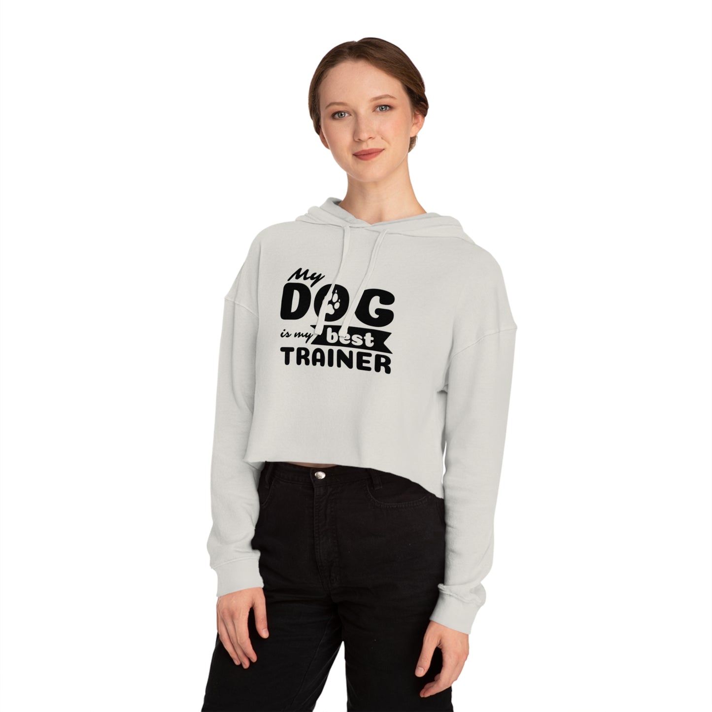 Person wearing a gray hoodie with 'My dog is my best trainer' text on a white background