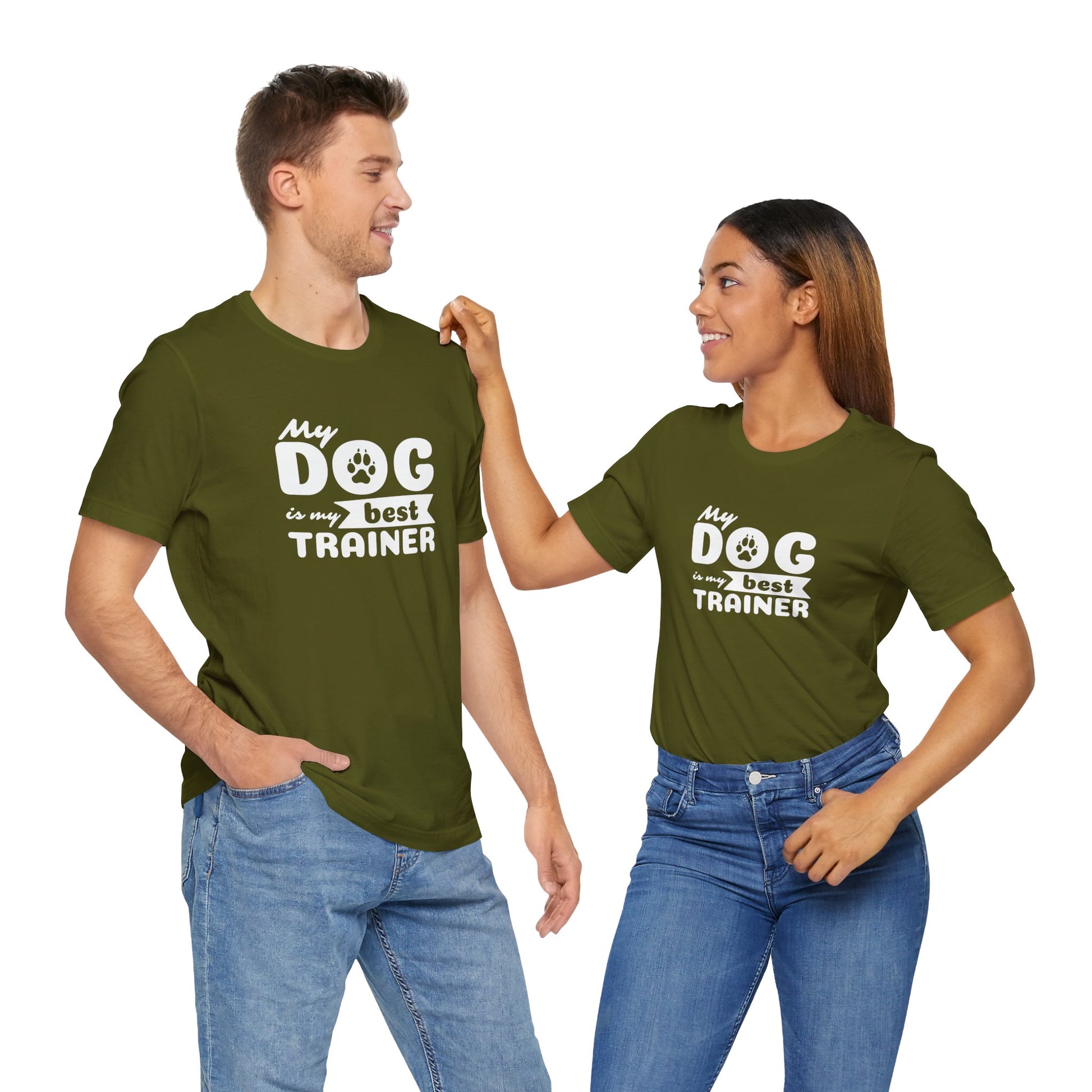 Two people wearing green t-shirts with 'My dog is my best trainer' text on a white background