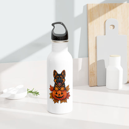 White water bottle with a dog and pumpkin design on a white surface.