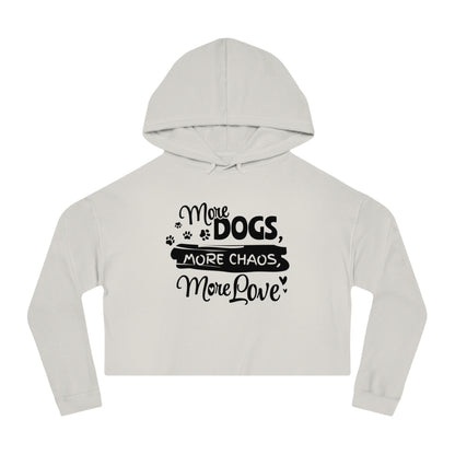 White cropped hoodie with text 'More Dogs, More Chaos, More Love' on a white background