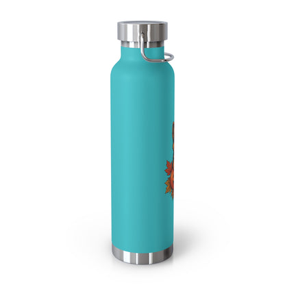 Turquoise water bottle with silver cap and handle on a white background