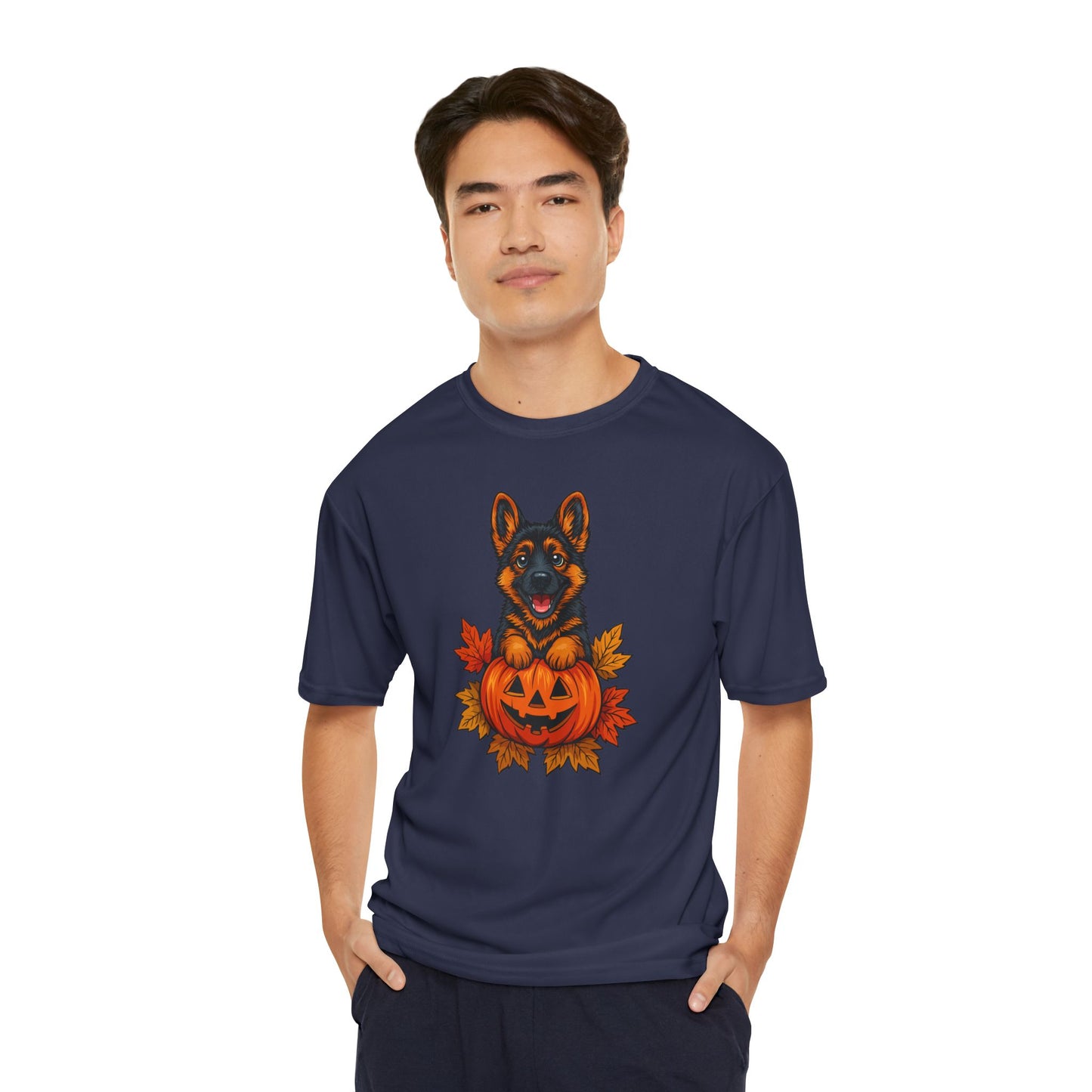 Man wearing a navy blue t-shirt with a dog and pumpkin design on a white background