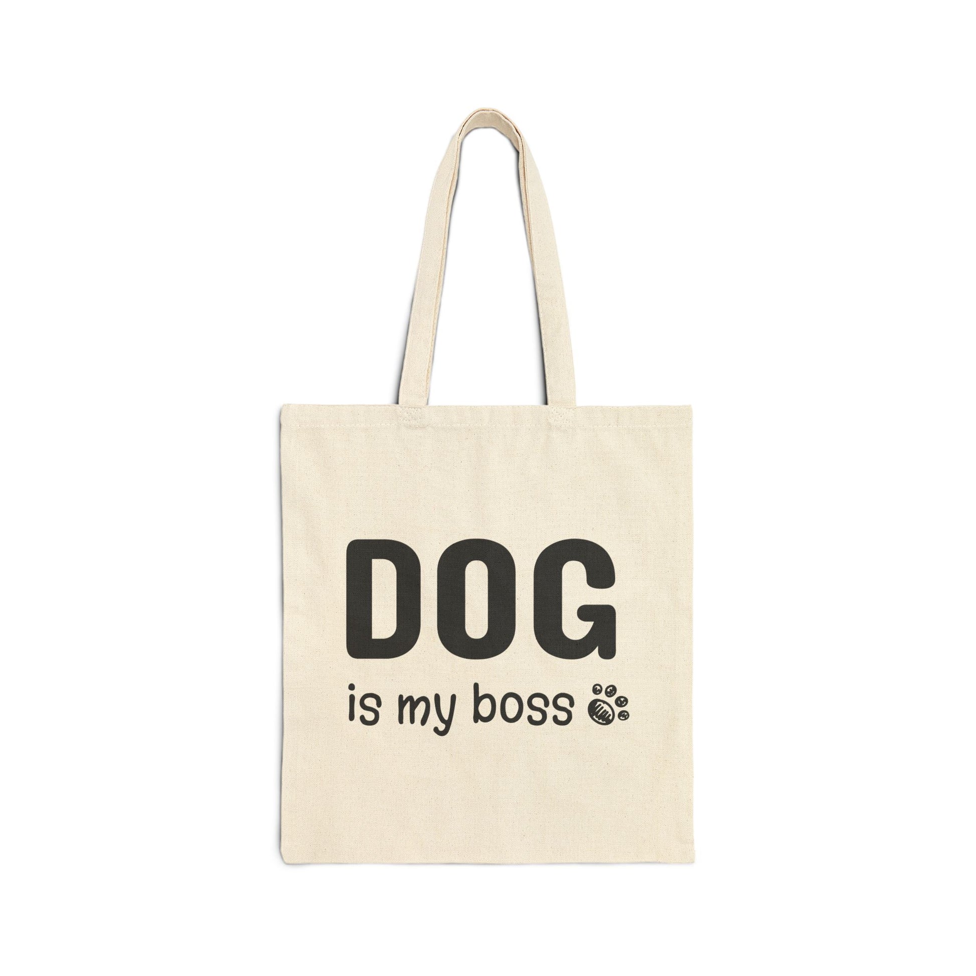 Beige tote bag with 'DOG is my boss' text on a white background