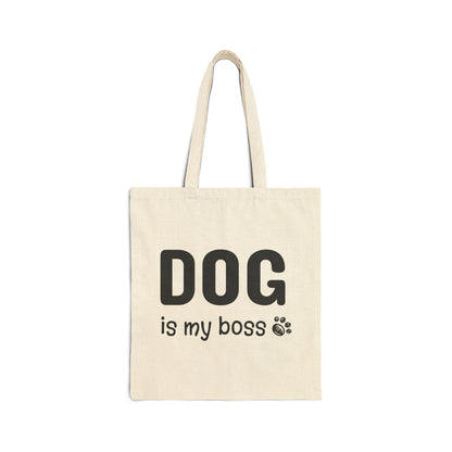 Beige tote bag with 'DOG is my boss' text on a white background