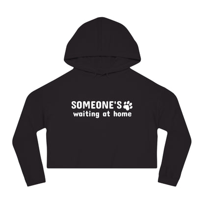 Black cropped hoodie with 'SOMEONE'S waiting at home' text on a white background