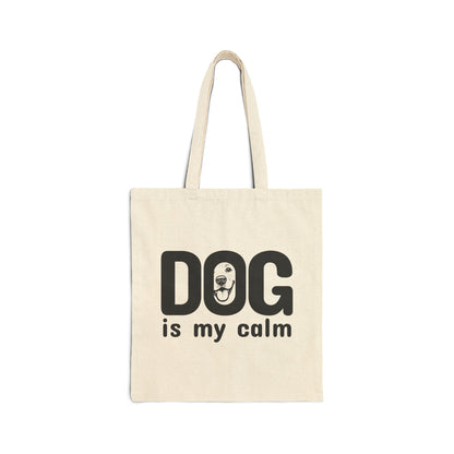 Beige tote bag with 'DOG is my calm' text on a white background