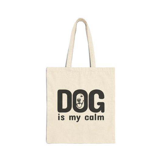 Beige tote bag with 'DOG is my calm' text on a white background