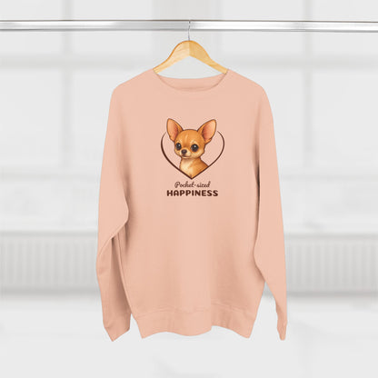 Pink sweatshirt with a dog illustration and text on a hanger against a white background
