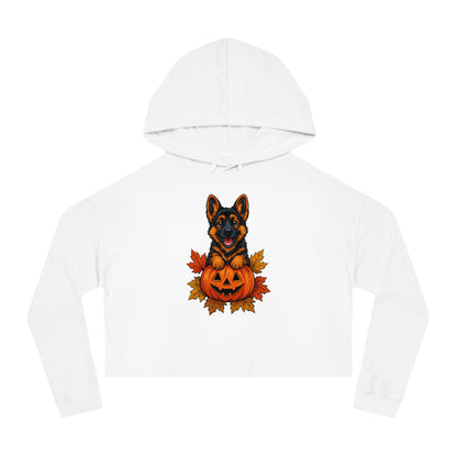 White hoodie with a German Shepherd holding a pumpkin design on a white background