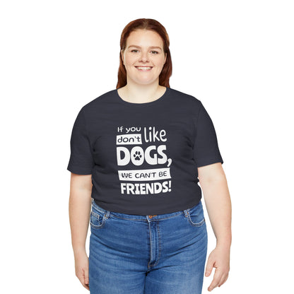 Person wearing a navy blue t-shirt with white text on a white background