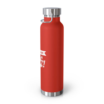 Red water bottle with silver cap on a white background