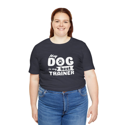 Person wearing a navy blue t-shirt with 'My dog is my best trainer' text on a white background