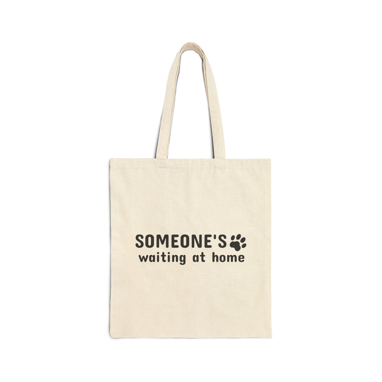 Beige tote bag with 'SOMEONE'S waiting at home' text on a white background