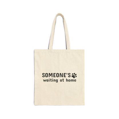 Beige tote bag with 'SOMEONE'S waiting at home' text on a white background