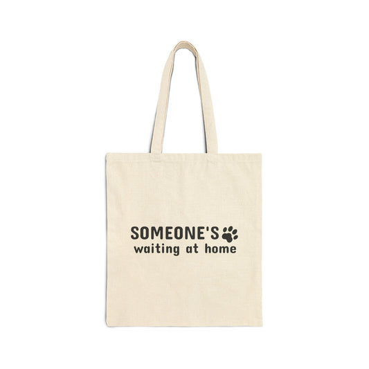 Beige tote bag with 'SOMEONE'S waiting at home' text on a white background