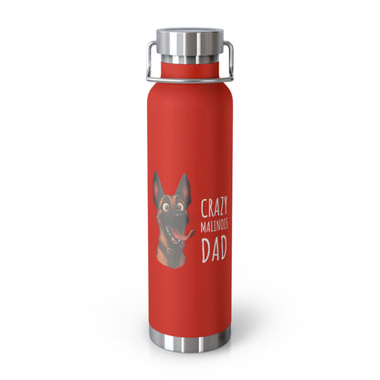 Red water bottle with a dog illustration and text on a white background