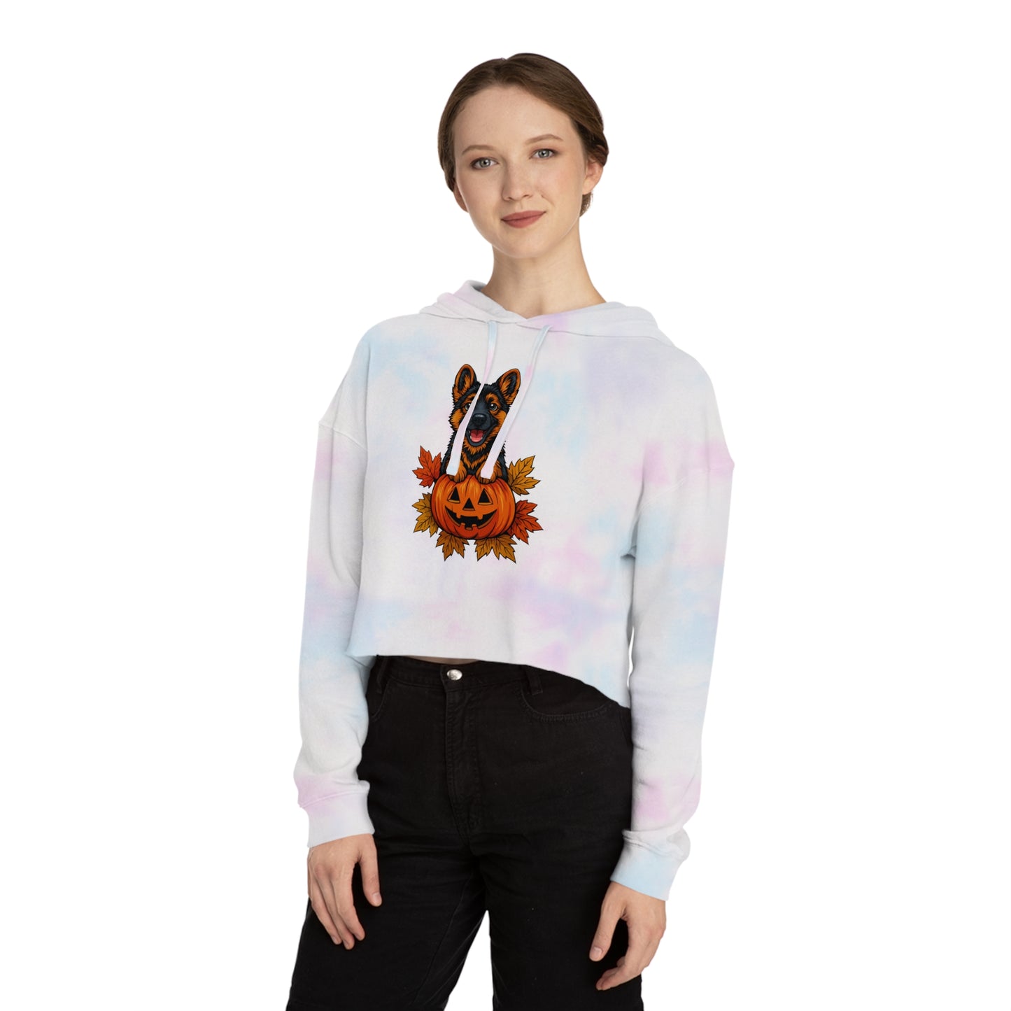 Person wearing a tie-dye hoodie with a jack-o'-lantern design on a white background