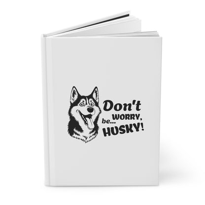 White notebook with a husky illustration and text on a white background